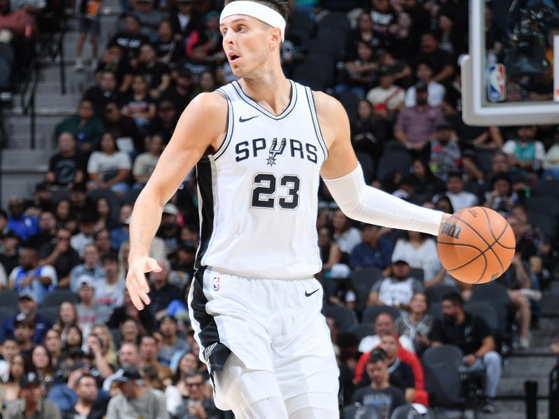 SAN ANTONIO, TX - NOVEMBER 7: Zach Collins #23 of the San Antonio Spurs dribbles the ball during the game against the Portland Trail Blazers on November 7, 2024 at the Frost Bank Center in San Antonio, Texas. NOTE TO USER: User expressly acknowledges and agrees that, by downloading and or using this photograph, user is consenting to the terms and conditions of the Getty Images License Agreement. Mandatory Copyright Notice: Copyright 2024 NBAE (Photos by Michael Gonzales/NBAE via Getty Images)