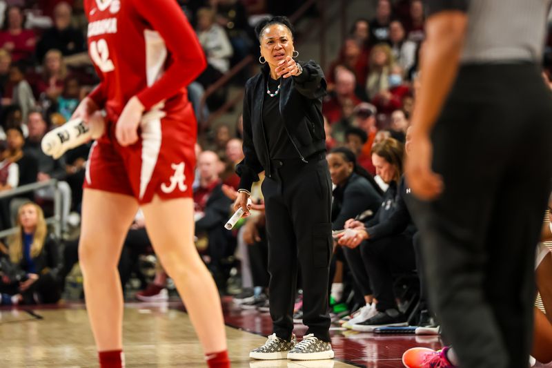 Feb 22, 2024; Columbia, South Carolina, USA; South Carolina Gamecocks head coach Dawn Staley disputes a call against the Alabama Crimson Tide in the first half at Colonial Life Arena. Mandatory Credit: Jeff Blake-USA TODAY Sports