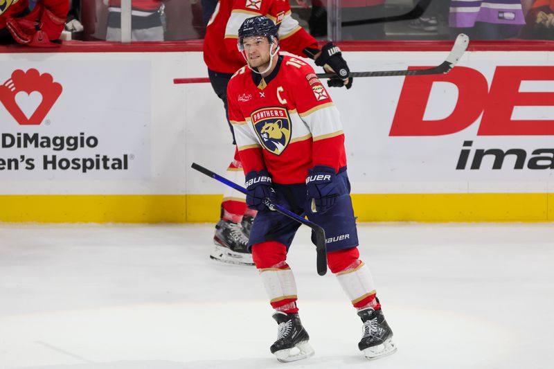 Dec 8, 2023; Sunrise, Florida, USA; Florida Panthers center Aleksander Barkov (16) looks on after scoring on an empty net against the Pittsburgh Penguins during the third period at Amerant Bank Arena. Mandatory Credit: Sam Navarro-USA TODAY Sports