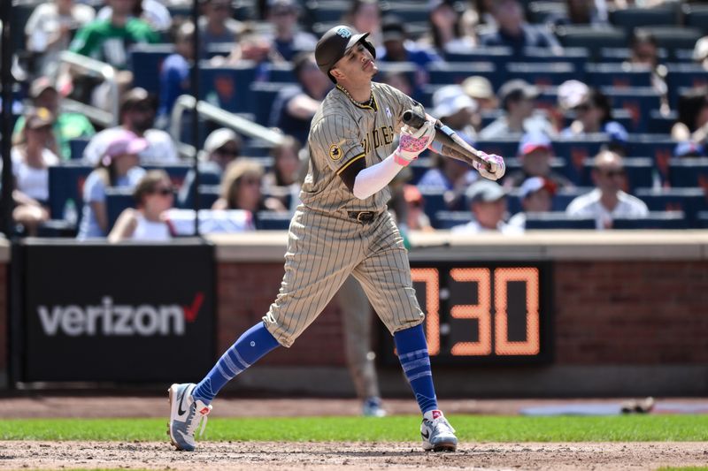 Jun 16, 2024; New York City, New York, USA; San Diego Padres third baseman Manny Machado (13) reacts after striking out against the New York Mets during the fourth inning at Citi Field. Mandatory Credit: John Jones-USA TODAY Sports