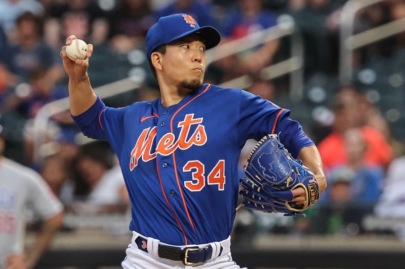 Aug 7, 2023; New York City, New York, USA; New York Mets starting pitcher Kodai Senga (34) delivers a pitch during the first inning against the Chicago Cubs at Citi Field. Mandatory Credit: Vincent Carchietta-USA TODAY Sports