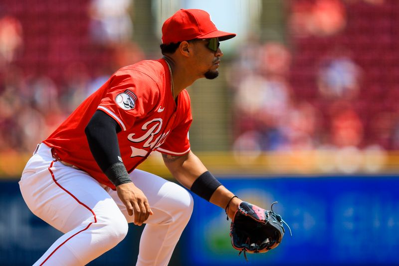 Jul 13, 2025; Cincinnati, Ohio, USA; Cincinnati Reds third baseman Santiago Espinal (4) prepares for the pitch in the sixth inning against the Colorado Rockies at Great American Ball Park. Mandatory Credit: Katie Stratman-Imagn Images
