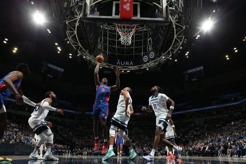 MINNEAPOLIS, MN -  MARCH 27:  Jalen Duren #0 of the Detroit Pistons drives to the basket during the game against the Minnesota Timberwolves on March 27, 2024 at Target Center in Minneapolis, Minnesota. NOTE TO USER: User expressly acknowledges and agrees that, by downloading and or using this Photograph, user is consenting to the terms and conditions of the Getty Images License Agreement. Mandatory Copyright Notice: Copyright 2024 NBAE (Photo by David Sherman/NBAE via Getty Images)