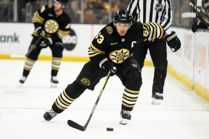 Apr 6, 2024; Boston, Massachusetts, USA; Boston Bruins left wing Brad Marchand (63) skates with the puck during the third period against the Florida Panthers at TD Garden. Mandatory Credit: Bob DeChiara-USA TODAY Sports