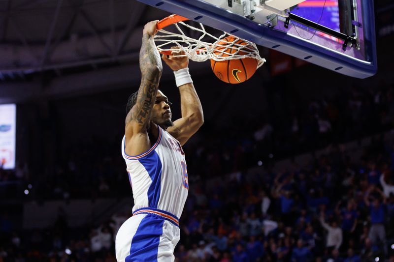 Jan 7, 2025; Gainesville, Florida, USA; Florida Gators guard Alijah Martin (15) dunks the ball against the Tennessee Volunteers during the second half at Exactech Arena at the Stephen C. O'Connell Center. Mandatory Credit: Matt Pendleton-Imagn Images