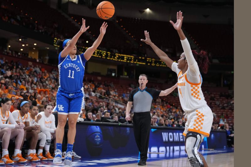 Mar 3, 2023; Greenville, SC, USA; Kentucky Wildcats guard Jada Walker (11) shoots the ball over Tennessee Lady Vols guard Jordan Walker (4) in the first half at Bon Secours Wellness Arena. Mandatory Credit: David Yeazell-USA TODAY Sports