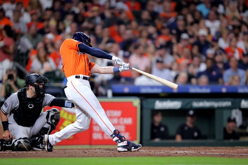 Sep 1, 2023; Houston, Texas, USA; Houston Astros right fielder Kyle Tucker (30) hits an RBI double to center field against the New York Yankees during the third inning at Minute Maid Park. Mandatory Credit: Erik Williams-USA TODAY Sports
