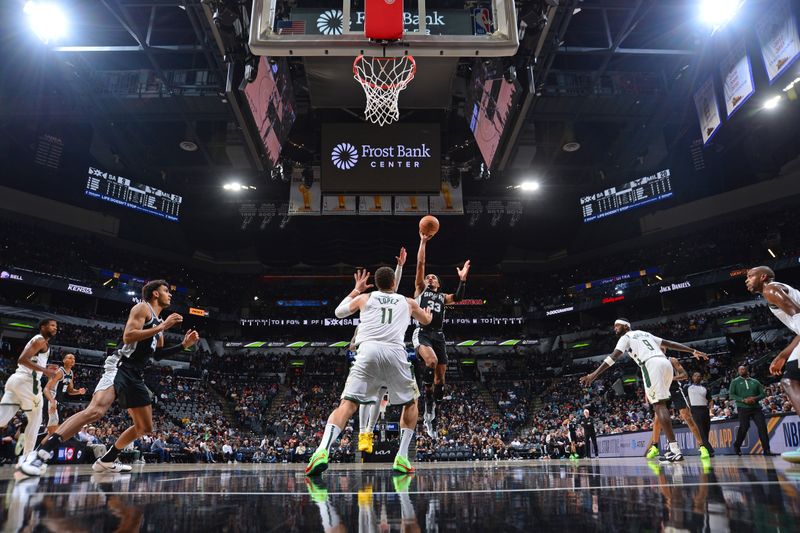 SAN ANTONIO, TX - JANUARY 4: Tre Jones #33 of the San Antonio Spurs shoots the ball during the game against the Milwaukee Bucks on January 4, 2024 at the Frost Bank Center in San Antonio, Texas. NOTE TO USER: User expressly acknowledges and agrees that, by downloading and or using this photograph, user is consenting to the terms and conditions of the Getty Images License Agreement. Mandatory Copyright Notice: Copyright 2024 NBAE (Photos by Michael Gonzales/NBAE via Getty Images)