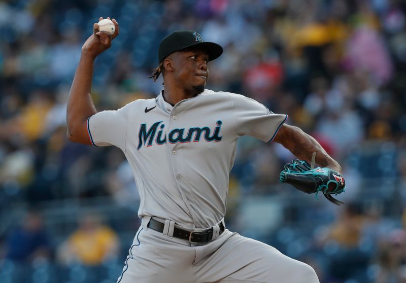 Oct 1, 2023; Pittsburgh, Pennsylvania, USA;  Miami Marlins relief pitcher Huascar Brazoban (31) pitches against the Pittsburgh Pirates during the seventh inning at PNC Park. Pittsburgh won 3-0. Mandatory Credit: Charles LeClaire-USA TODAY Sports