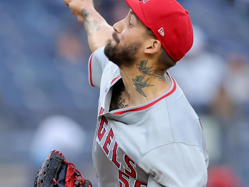 Aug 7, 2024; Bronx, New York, USA; Los Angeles Angels relief pitcher Hans Crouse (52) pitches against the New York Yankees during the sixth inning at Yankee Stadium. Mandatory Credit: Brad Penner-USA TODAY Sports