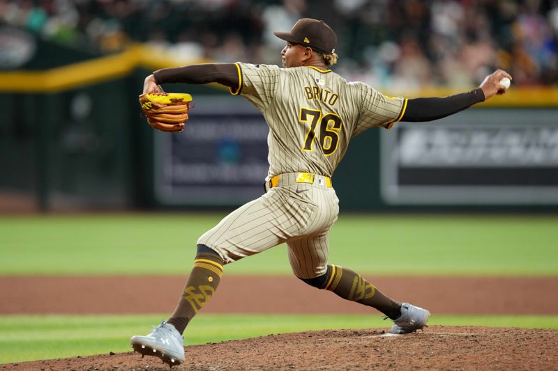 May 3, 2024; Phoenix, Arizona, USA; San Diego Padres pitcher Jhony Brito (76) pitches against the Arizona Diamondbacks during the ninth inning at Chase Field. Mandatory Credit: Joe Camporeale-USA TODAY Sports