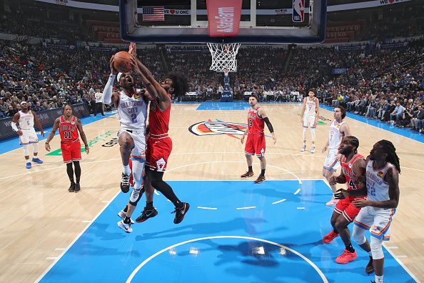 OKLAHOMA CITY, OK - NOVEMBER 22:  Shai Gilgeous-Alexander #2 of the Oklahoma City Thunder drives to the basket during the game against the Chicago Bulls on November 22, 2023 at Paycom Arena in Oklahoma City, Oklahoma. NOTE TO USER: User expressly acknowledges and agrees that, by downloading and or using this photograph, User is consenting to the terms and conditions of the Getty Images License Agreement. Mandatory Copyright Notice: Copyright 2023 NBAE (Photo by Zach Beeker/NBAE via Getty Images)