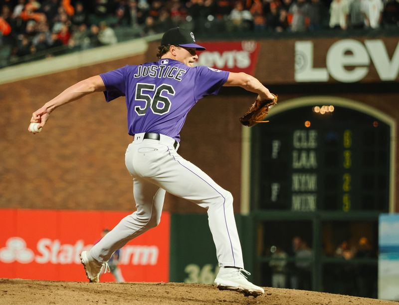 Sep 8, 2023; San Francisco, California, USA; Colorado Rockies relief pitcher Evan Justice (56) pitches the ball against the San Francisco Giants during the eighth inning at Oracle Park. Mandatory Credit: Kelley L Cox-USA TODAY Sports