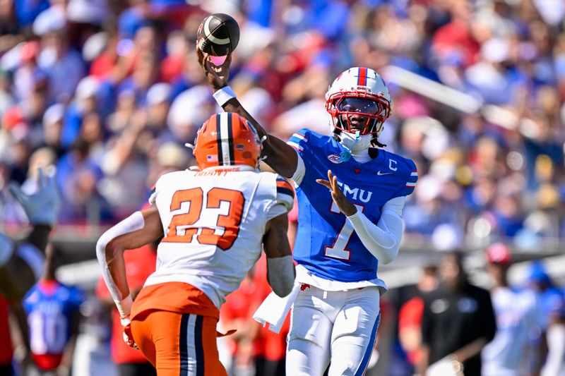 Oct 4, 2025; Dallas, Texas, USA; SMU Mustangs quarterback Kevin Jennings (7) throws a pass for a touchdown over Syracuse Orange defensive back Devin Grant (23) during the first half at Gerald J. Ford Stadium. Mandatory Credit: Jerome Miron-Imagn Images