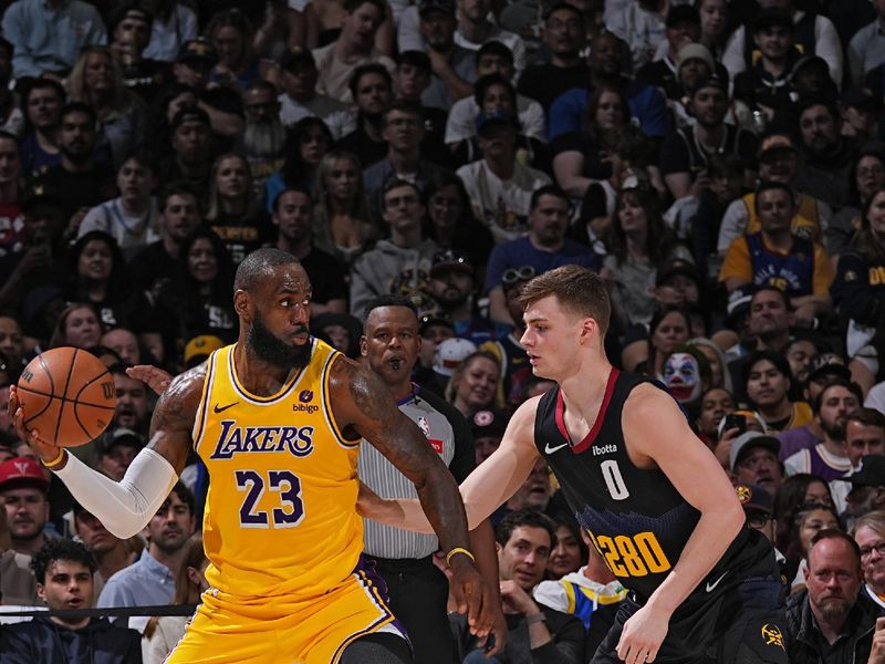 DENVER, CO - APRIL 22: LeBron James #23 of the Los Angeles Lakers handles the ball during the game against the Denver Nuggets on April 22, 2024 at the Ball Arena in Denver, Colorado. NOTE TO USER: User expressly acknowledges and agrees that, by downloading and/or using this Photograph, user is consenting to the terms and conditions of the Getty Images License Agreement. Mandatory Copyright Notice: Copyright 2024 NBAE (Photo by Bart Young/NBAE via Getty Images)