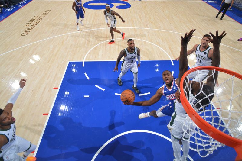 PHILADELPHIA, PA - OCTOBER 23: Tyrese Maxey #0 of the Philadelphia 76ers drives to the basket during the game against the Milwaukee Bucks on October 23, 2024 at the Wells Fargo Center in Philadelphia, Pennsylvania NOTE TO USER: User expressly acknowledges and agrees that, by downloading and/or using this Photograph, user is consenting to the terms and conditions of the Getty Images License Agreement. Mandatory Copyright Notice: Copyright 2024 NBAE (Photo by Jesse D. Garrabrant/NBAE via Getty Images)