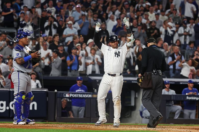 Oct 5, 2024; Bronx, New York, USA; New York Yankees second base Gleyber Torres (25) celebrates after hitting a two run home run during the third inning against the Kansas City Royals during game one of the ALDS for the 2024 MLB Playoffs at Yankee Stadium. Mandatory Credit: Vincent Carchietta-Imagn Images