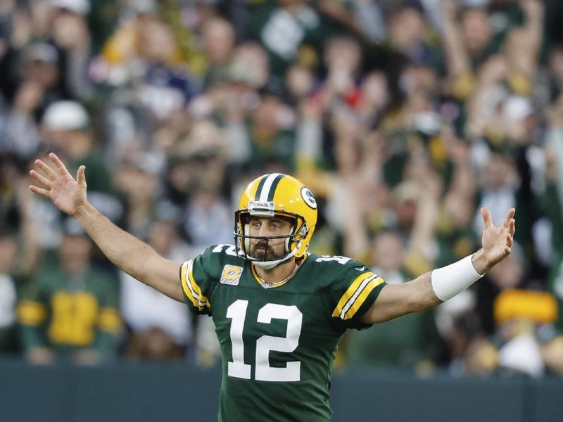 Green Bay Packers quarterback Aaron Rodgers (12) reacts during an NFL game against the New England Patriots Sunday, Oct. 2, 2022, in Green Bay, Wis. (AP Photo/Jeffrey Phelps)