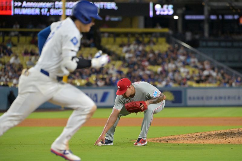 Sep 16, 2025; Los Angeles, California, USA;  Los Angeles Dodgers designated hitter Shohei Ohtani (17) grounds out to Philadelphia Phillies relief pitcher Jhoan Duran (59) for the last out of the ninth inning at Dodger Stadium. Mandatory Credit: Jayne Kamin-Oncea-Imagn Images