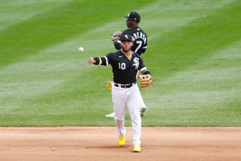 Sep 28, 2023; Chicago, Illinois, USA; Chicago White Sox third baseman Yoan Moncada (10) throws to first base for an out against the Arizona Diamondbacks during the eight inning at Guaranteed Rate Field. Mandatory Credit: Kamil Krzaczynski-USA TODAY Sports