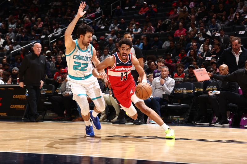 WASHINGTON, DC -? MARCH 8: Jordan Poole #13 of the Washington Wizards drives to the basket during the game against the Charlotte Hornets on March 8, 2024 at Capital One Arena in Washington, DC. NOTE TO USER: User expressly acknowledges and agrees that, by downloading and or using this Photograph, user is consenting to the terms and conditions of the Getty Images License Agreement. Mandatory Copyright Notice: Copyright 2024 NBAE (Photo by Kenny Giarla/NBAE via Getty Images)