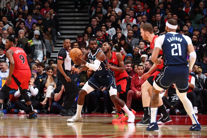 TORONTO, CANADA - FEBRUARY 28: Tim Hardaway Jr. #10 of the Dallas Mavericks dribbles the ball during the game against the Toronto Raptors on February 28, 2024 at the Scotiabank Arena in Toronto, Ontario, Canada.  NOTE TO USER: User expressly acknowledges and agrees that, by downloading and or using this Photograph, user is consenting to the terms and conditions of the Getty Images License Agreement.  Mandatory Copyright Notice: Copyright 2024 NBAE (Photo by Vaughn Ridley/NBAE via Getty Images)