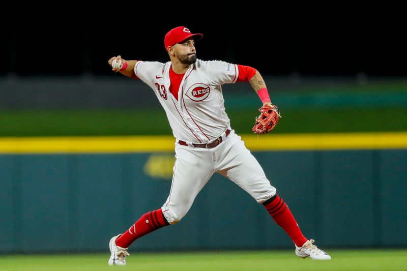 Sep 19, 2023; Cincinnati, Ohio, USA; Cincinnati Reds third baseman Christian Encarnacion-Strand (33) throws to first to get Minnesota Twins shortstop Kyle Farmer (not pictured) out in the seventh inning at Great American Ball Park. Mandatory Credit: Katie Stratman-USA TODAY Sports