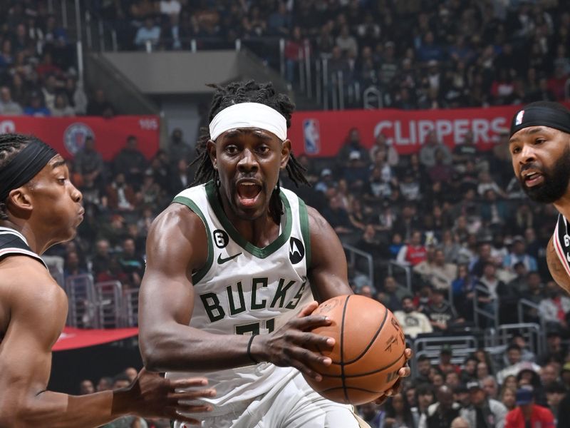 LOS ANGELES, CA - FEBRUARY 10: Jrue Holiday #21 of the Milwaukee Bucks dribbles the ball during the game against the LA Clippers on February 10, 2023 at Crypto.Com Arena in Los Angeles, California. NOTE TO USER: User expressly acknowledges and agrees that, by downloading and/or using this Photograph, user is consenting to the terms and conditions of the Getty Images License Agreement. Mandatory Copyright Notice: Copyright 2023 NBAE (Photo by Andrew D. Bernstein/NBAE via Getty Images)