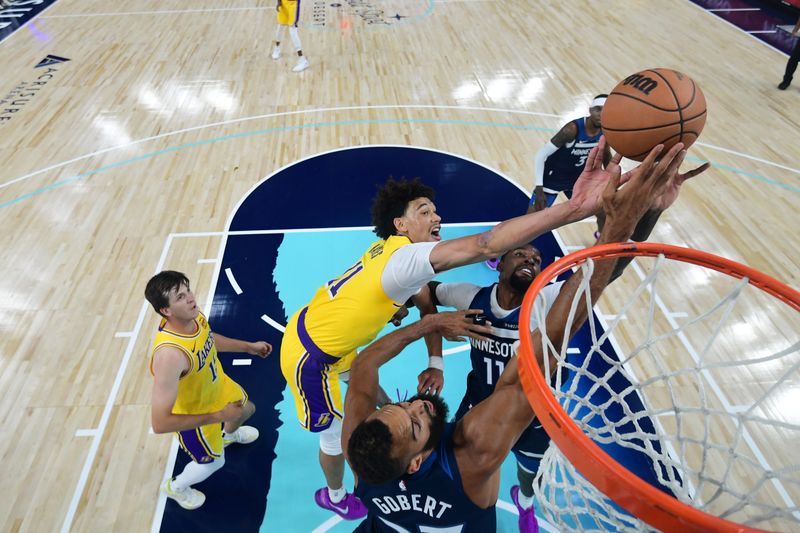 PALM SPRINGS, CA - OCTOBER 4: Jaxson Hayes #11 of the Los Angeles Lakers rebounds the ball during the game against the Minnesota Timberwolves during an NBA preseason game on October 4, 2024 at Acrisure Arena in Palm Springs, California. NOTE TO USER: User expressly acknowledges and agrees that, by downloading and/or using this Photograph, user is consenting to the terms and conditions of the Getty Images License Agreement. Mandatory Copyright Notice: Copyright 2024 NBAE (Photo by Adam Pantozzi/NBAE via Getty Images)