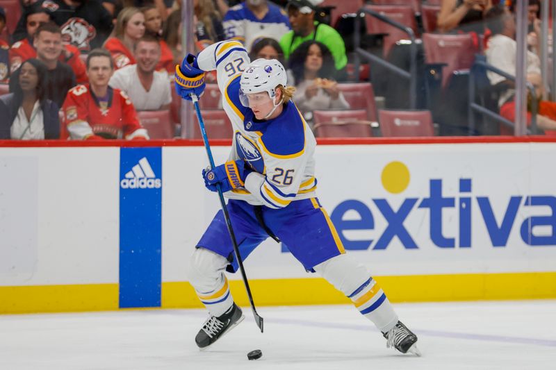 Apr 4, 2023; Sunrise, Florida, USA; Buffalo Sabres defenseman Rasmus Dahlin (26) moves the puck during the first period against the Florida Panthers at FLA Live Arena. Mandatory Credit: Sam Navarro-USA TODAY Sports