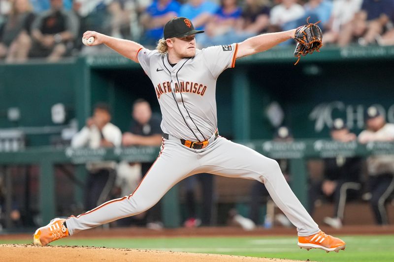 Jun 7, 2024; Arlington, Texas, USA; San Francisco Giants starting pitcher Logan Webb (62) delivers a pitch to the Texas Rangers during the first inning at Globe Life Field. Mandatory Credit: Jim Cowsert-USA TODAY Sports