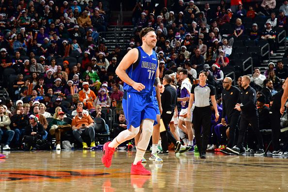 PHOENIX, AZ - DECEMBER 25: Luka Doncic #77 of the Dallas Mavericks smiles during the game Phoenix Suns on December 25, 2023 at Footprint Center in Phoenix, Arizona. NOTE TO USER: User expressly acknowledges and agrees that, by downloading and or using this photograph, user is consenting to the terms and conditions of the Getty Images License Agreement. Mandatory Copyright Notice: Copyright 2023 NBAE (Photo by Kate Frese/NBAE via Getty Images)