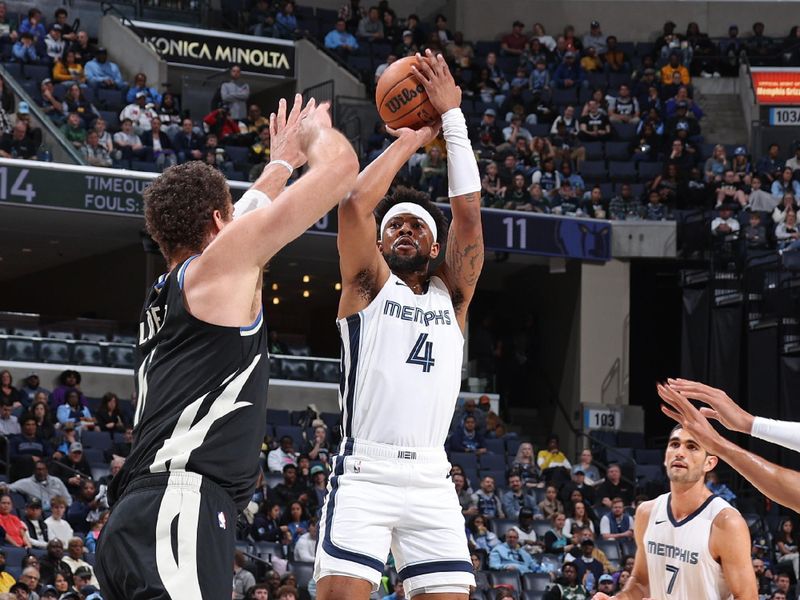 MEMPHIS, TN - FEBRUARY 15: Jordan Goodwin #4 of the Memphis Grizzlies shoots the ball during the game against the Milwaukee Bucks on February 15, 2024 at FedExForum in Memphis, Tennessee. NOTE TO USER: User expressly acknowledges and agrees that, by downloading and or using this photograph, User is consenting to the terms and conditions of the Getty Images License Agreement. Mandatory Copyright Notice: Copyright 2024 NBAE (Photo by Stephen Gosling/NBAE via Getty Images)