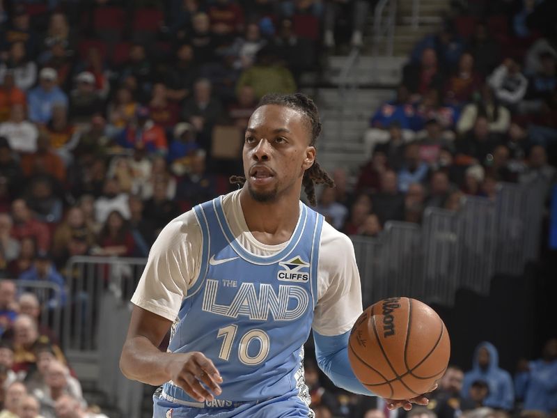 CLEVELAND, OH - DECEMBER 8:  Darius Garland #10 of the Cleveland Cavaliers dribbles the ball during the game against the Denver Nuggets =on December 5, 2024 at Rocket Mortgage FieldHouse in Cleveland, Ohio. NOTE TO USER: User expressly acknowledges and agrees that, by downloading and/or using this Photograph, user is consenting to the terms and conditions of the Getty Images License Agreement. Mandatory Copyright Notice: Copyright 2024 NBAE (Photo by David Liam Kyle/NBAE via Getty Images)