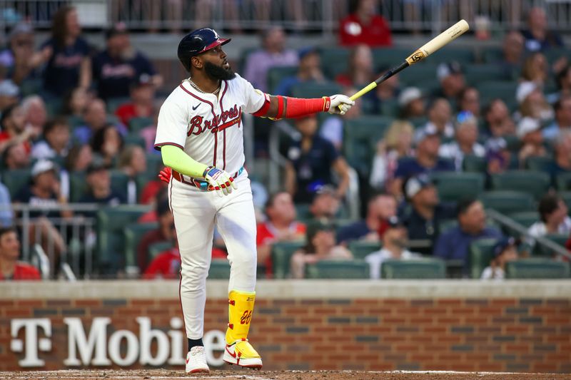 May 8, 2024; Atlanta, Georgia, USA; Atlanta Braves designated hitter Marcell Ozuna (20) hits a solo home run against the Boston Red Sox in the third inning at Truist Park. Mandatory Credit: Brett Davis-USA TODAY Sports
