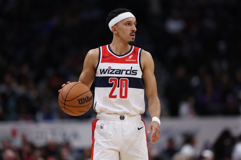 WASHINGTON, DC - NOVEMBER 15: Landry Shamet #20 of the Washington Wizards dribbles against the Dallas Mavericks during the second half at Capital One Arena on November 15, 2023 in Washington, DC. NOTE TO USER: User expressly acknowledges and agrees that, by downloading and or using this photograph, User is consenting to the terms and conditions of the Getty Images License Agreement. (Photo by Patrick Smith/Getty Images)