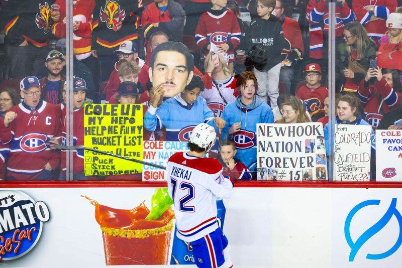 Mar 16, 2024; Calgary, Alberta, CAN; Montreal Canadiens defenseman Arber Xhekaj (72) interacts with fans during the warmup period against the Calgary Flames at Scotiabank Saddledome. Mandatory Credit: Sergei Belski-USA TODAY Sports