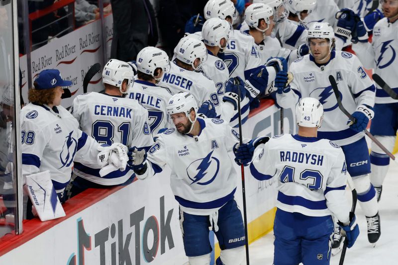 Nov 22, 2025; Washington, District of Columbia, USA; Tampa Bay Lightning right wing Nikita Kucherov (86) celebrates with teammates after scoring a goal against the Washington Capitals during the first period at Capital One Arena. Mandatory Credit: Geoff Burke-Imagn Images
