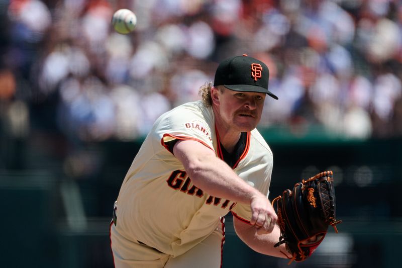 May 4, 2025; San Francisco, California, USA; San Francisco Giants starting pitcher Logan Webb (62) throws a pitch against the Colorado Rockies throws a pitch during the first inning at Oracle Park. Mandatory Credit: Robert Edwards-Imagn Images