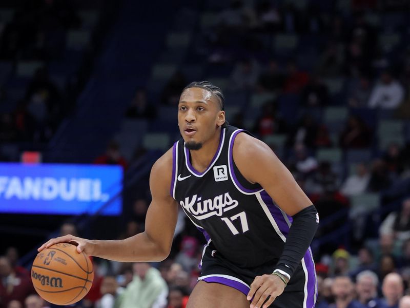 NEW ORLEANS, LOUISIANA - DECEMBER 12: Isaac Jones #17 of the Sacramento Kings drives with the ball against the New Orleans Pelicans during a game at the Smoothie King Center on December 12, 2024 in New Orleans, Louisiana. NOTE TO USER: User expressly acknowledges and agrees that, by downloading and or using this Photograph, user is consenting to the terms and conditions of the Getty Images License Agreement. (Photo by Jonathan Bachman/Getty Images)