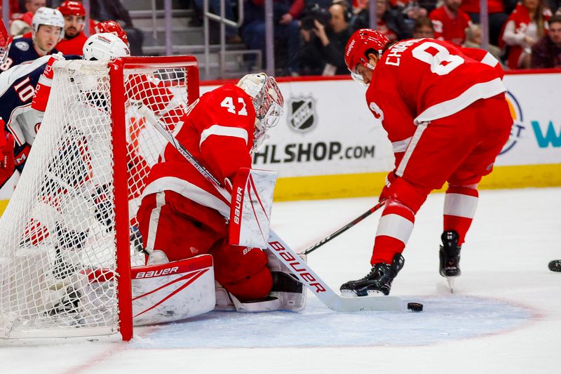 Mar 19, 2024; Detroit, Michigan, USA; Detroit Red Wings goaltender James Reimer (47) blocks a shot during the first period of the game against the Columbus Blue Jackets at Little Caesars Arena. Mandatory Credit: Brian Bradshaw Sevald-USA TODAY Sports