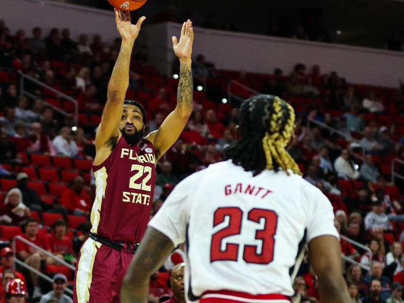 Feb 1, 2023; Raleigh, North Carolina, USA;  Florida State Seminoles guard Darin Green Jr. (22) shoots a three pointer during the second half against North Carolina State Wolfpack at PNC Arena.  Mandatory Credit: Jaylynn Nash-USA TODAY Sports