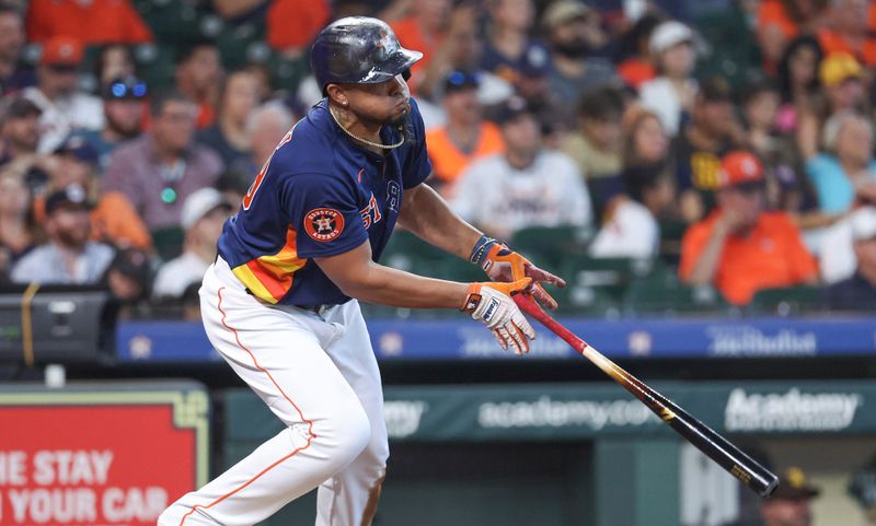 Sep 10, 2023; Houston, Texas, USA; Houston Astros first baseman Jose Abreu (79) hits a single during the sixth inning against the San Diego Padres at Minute Maid Park. Mandatory Credit: Troy Taormina-USA TODAY Sports