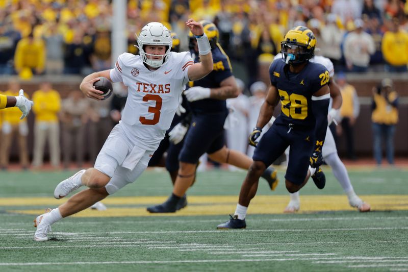 Sep 7, 2024; Ann Arbor, Michigan, USA; Texas Longhorns quarterback Quinn Ewers (3) rushes in the first half against the Michigan Wolverines at Michigan Stadium. Mandatory Credit: Rick Osentoski-Imagn Images