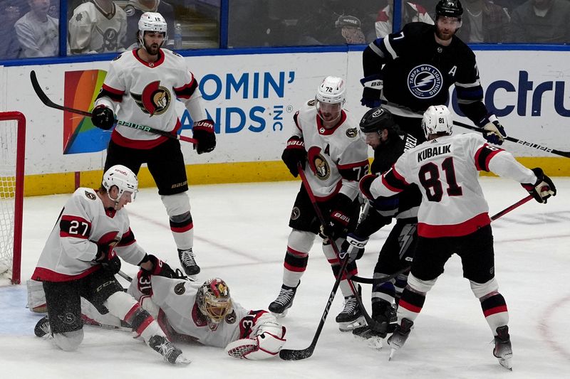 Feb 19, 2024; Tampa, Florida, USA; Ottawa Senators goalie Anton Forsberg (31) blocks a shot against the Tampa Bay Lightning during the second period at Amalie Arena. Mandatory Credit: Dave Nelson-USA TODAY Sports