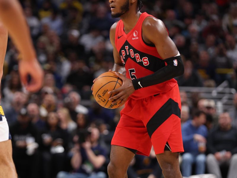 INDIANAPOLIS, IN - FEBRUARY 26:  Immanuel Quickley #5 of the Toronto Raptors handles the ball during the game against the Indiana Pacers on February 26, 2025 at Gainbridge Fieldhouse in Indianapolis, Indiana. NOTE TO USER: User expressly acknowledges and agrees that, by downloading and or using this Photograph, user is consenting to the terms and conditions of the Getty Images License Agreement. Mandatory Copyright Notice: Copyright 2025 NBAE (Photo by Pepper Robinson/NBAE via Getty Images)