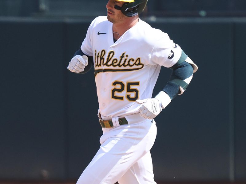 Sep 20, 2023; Oakland, California, USA; Oakland Athletics designated hitter Brett Rooker (25) rounds the bases on a solo home run against the Seattle Mariners during the sixth inning at Oakland-Alameda County Coliseum. Mandatory Credit: Kelley L Cox-USA TODAY Sports