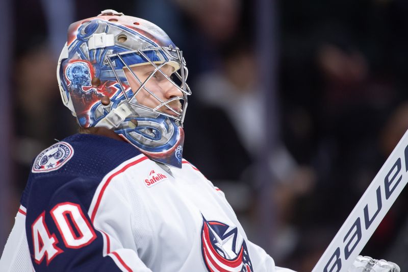 Feb 13, 2024; Ottawa, Ontario, CAN; Columbus Blue Jackets \goalie Daniil Tarasov (40) looks up the ice in the first period against the  Ottawa Senators at the Canadian Tire Centre. Mandatory Credit: Marc DesRosiers-USA TODAY Sports