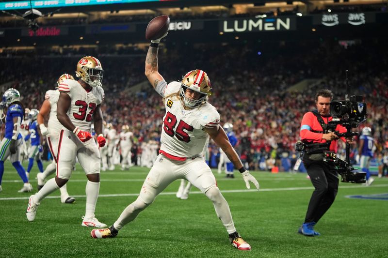 San Francisco 49ers' George Kittle (85) reacts after a touchdown against the Seattle Seahawks, Thursday, Oct. 10, 2024, in Seattle. (AP Photo/Lindsey Wasson)