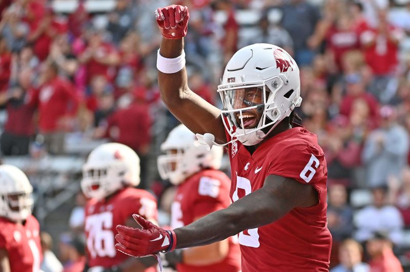 Sep 17, 2022; Pullman, Washington, USA; Washington State Cougars wide receiver Donovan Ollie (6) celebrates after a touchdown against the Colorado State Rams in the first half at Gesa Field at Martin Stadium. Mandatory Credit: James Snook-USA TODAY Sports